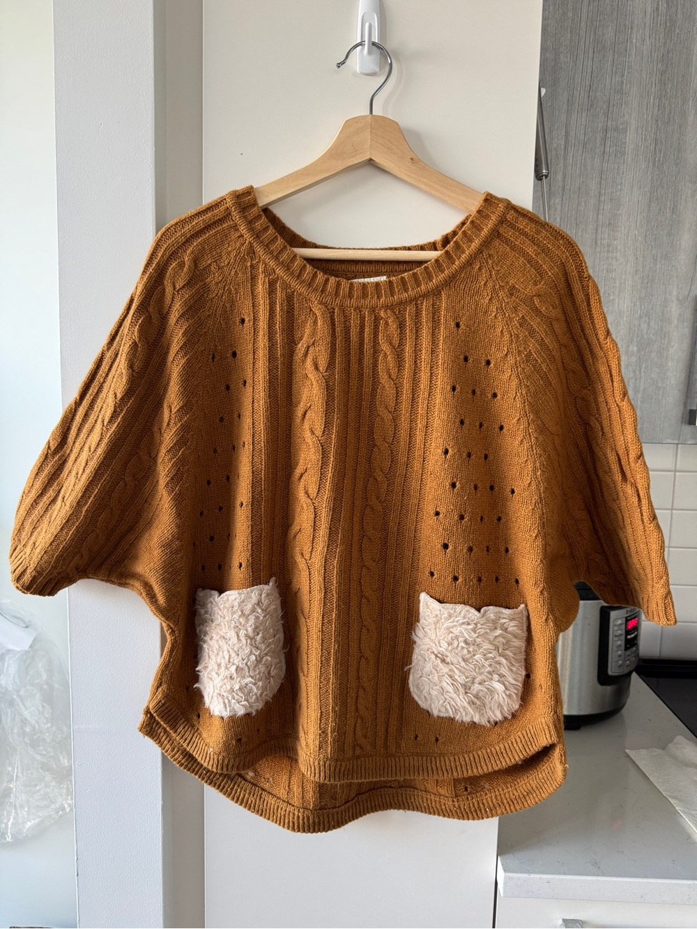 Cozy Cable-Knit Poncho Sweater with Faux Fur Pockets